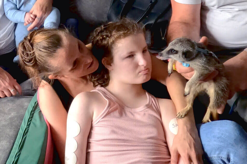 Sarah with a meerkat