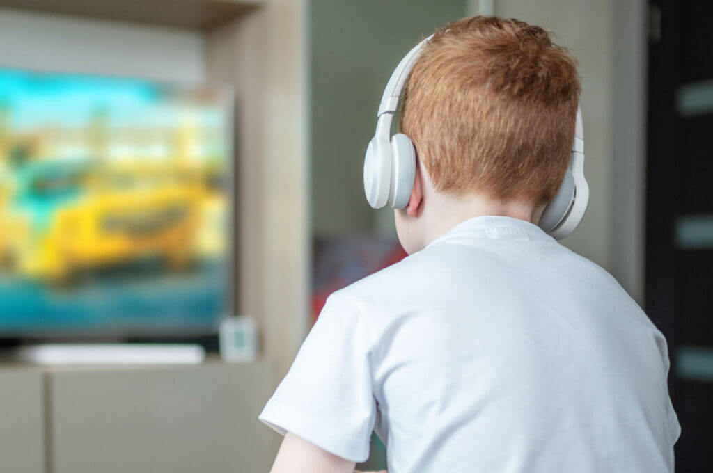 young boy listening to music